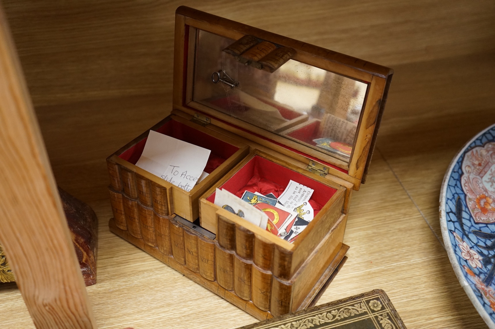A backgammon games box, Sorrento box, a red wax seal mounted lid and a carved oak floral appliqué, 65cm wide (4)